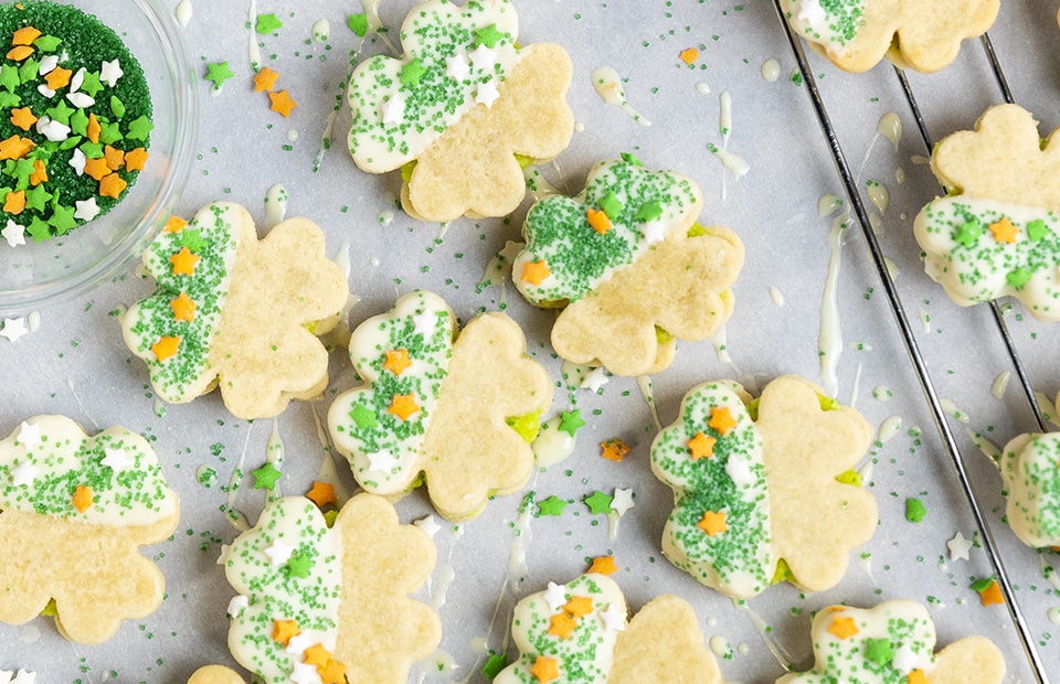 Picture of shamrock-shaped cookies with a baking rack